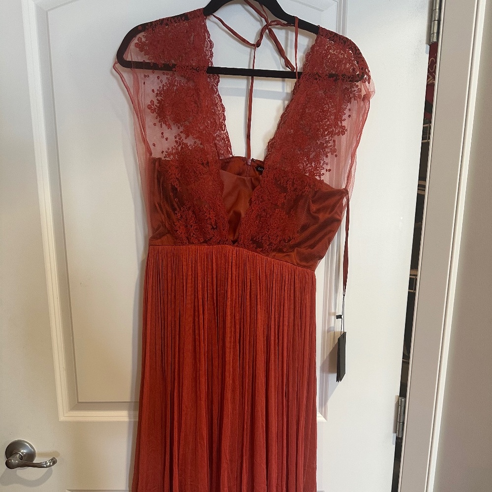 Rust coloured pleated lace overlay cocktail dress